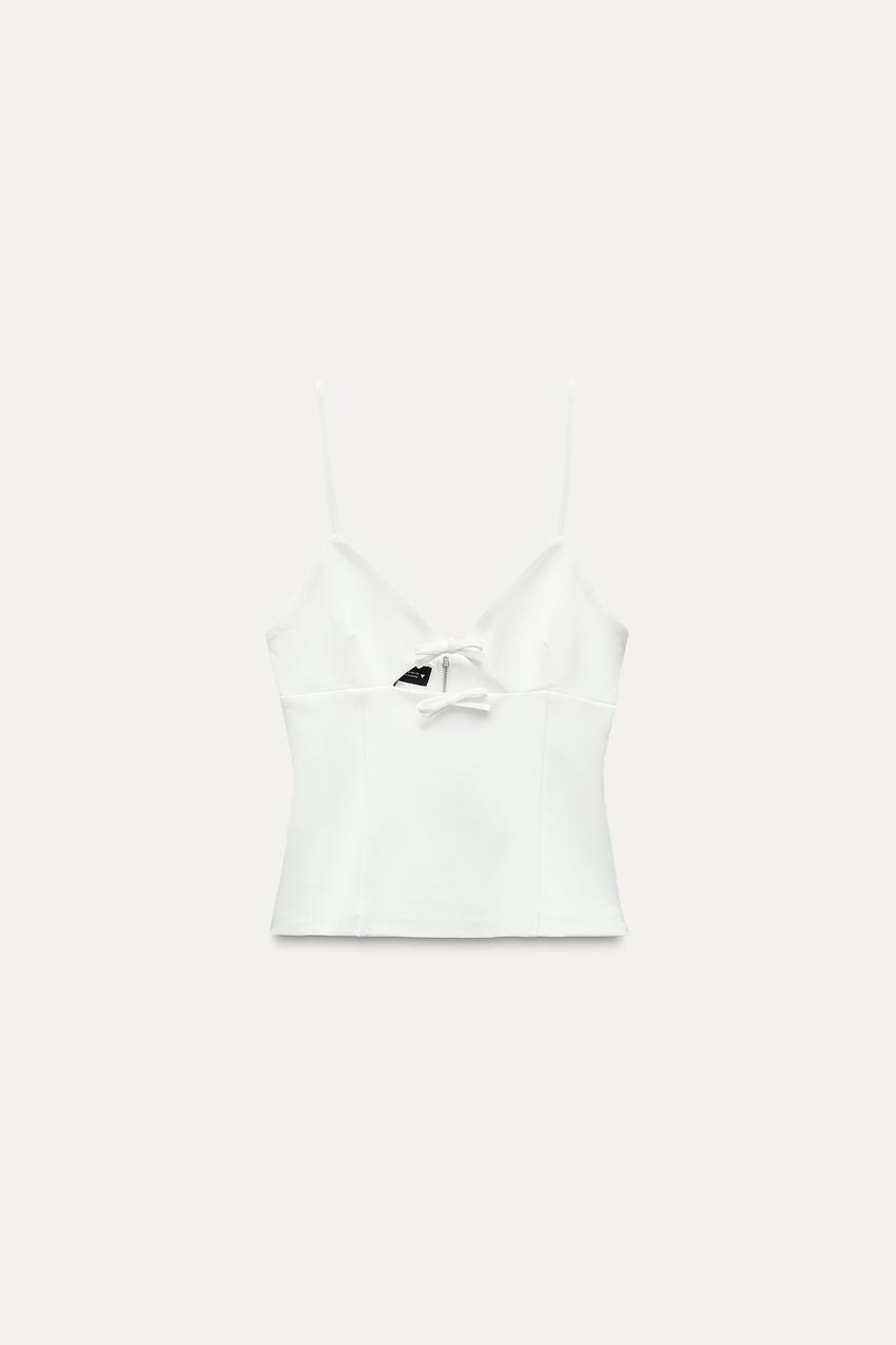 STRETCH TOP WITH CUT-OUT DETAIL AND BOWS